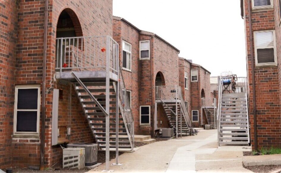 Allegheny Commons, Pittsburgh, PA — before: brick apartment buildings with exterior steel stairs